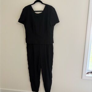 Vintage 90s Black Jumpsuit with Flattering Fit and Versatile Style
